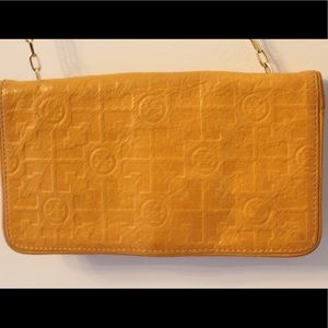 Yellow Tory Burch double sided wallet with gold chain